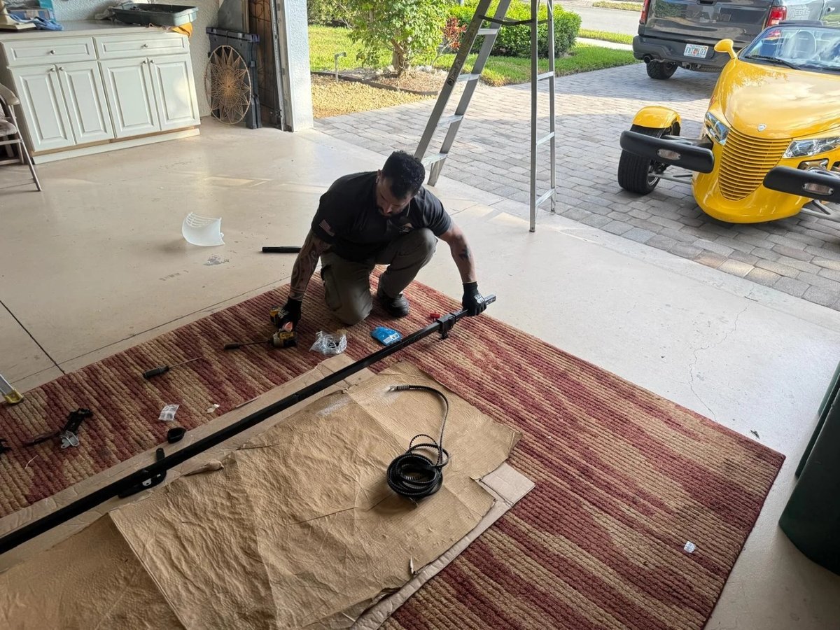 A Rock of Hampden technician on a job in Bethesda