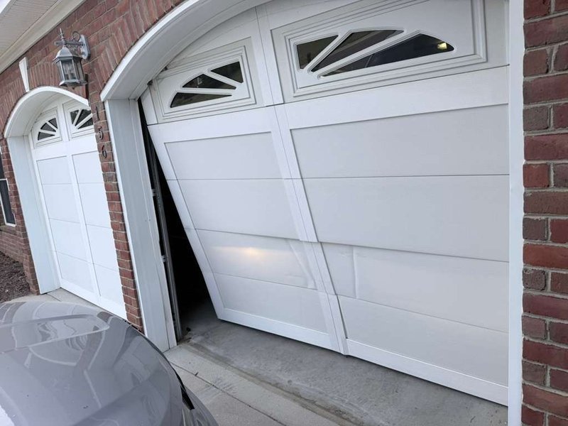 Off-Track Garage Door Repair by Rock of Hampden